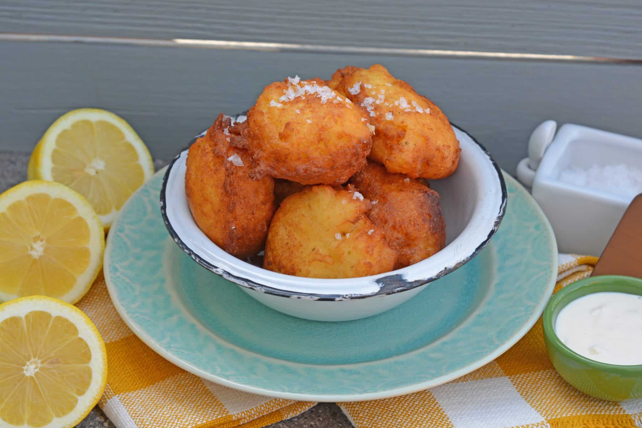 Lemon Ricotta Fritters are a savory fritter recipe. Smooth and and rich, they are filled with cheese with subtle lemon and sage. Served with garlic aioli!