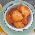 Lemon Ricotta Fritters are a savory fritter recipe. Smooth and and rich, they are filled with cheese with subtle lemon and sage. Served with garlic aioli!