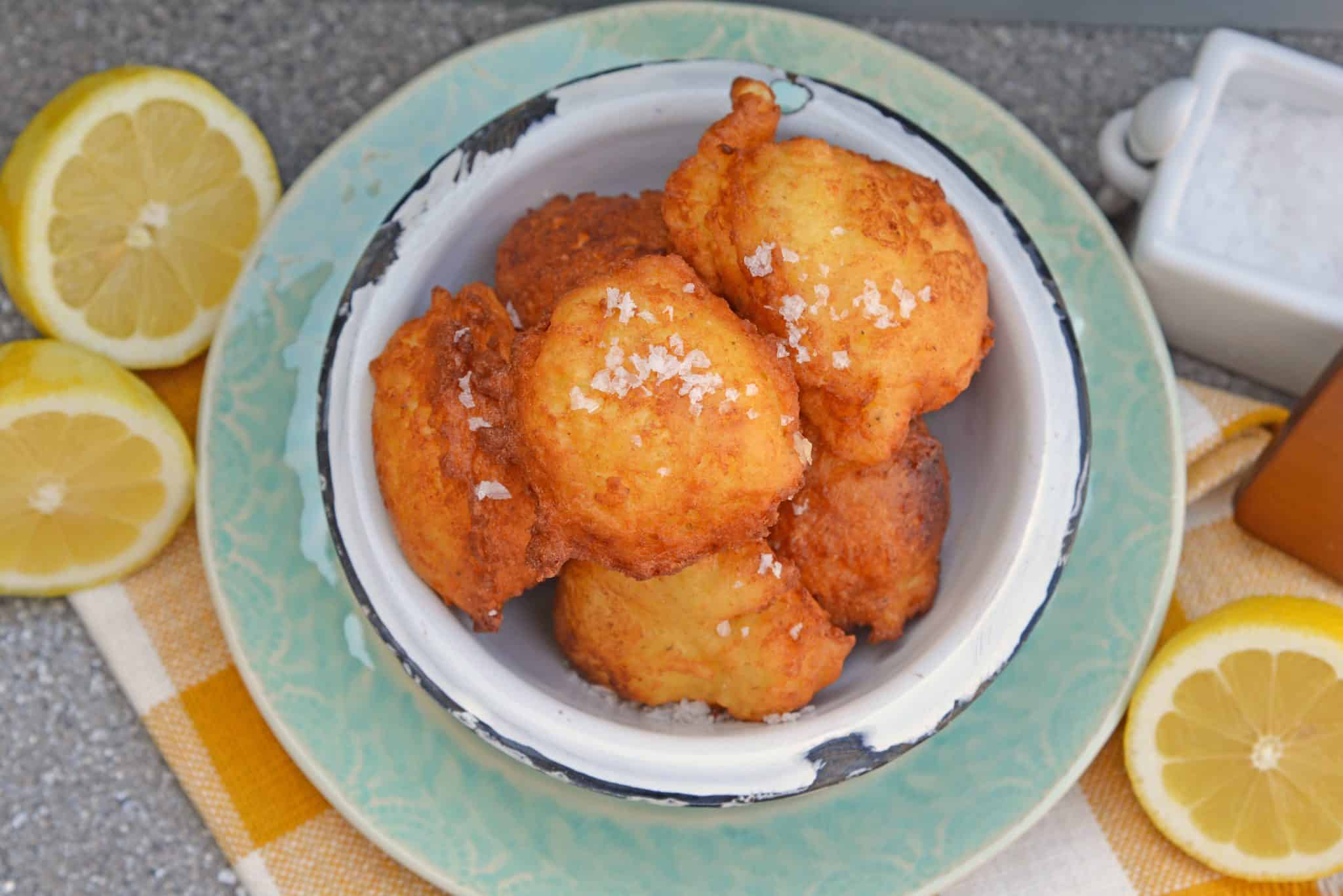 Lemon Ricotta Fritters are a savory fritter recipe. Smooth and and rich, they are filled with cheese with subtle lemon and sage. Served with garlic aioli!