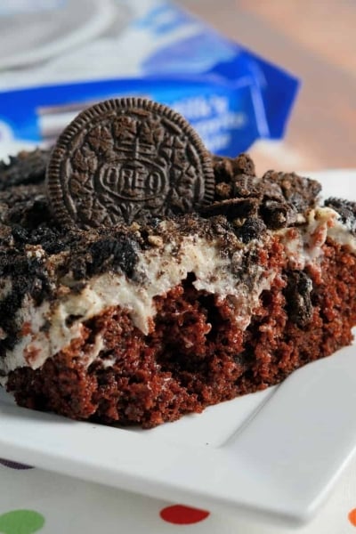 Oreo Poke Cake Recipe- with all of the Oreo dessert recipes out there, I can guarantee you that this is the easiest and best Oreo cake recipe out there. www.savoryexperiments.com