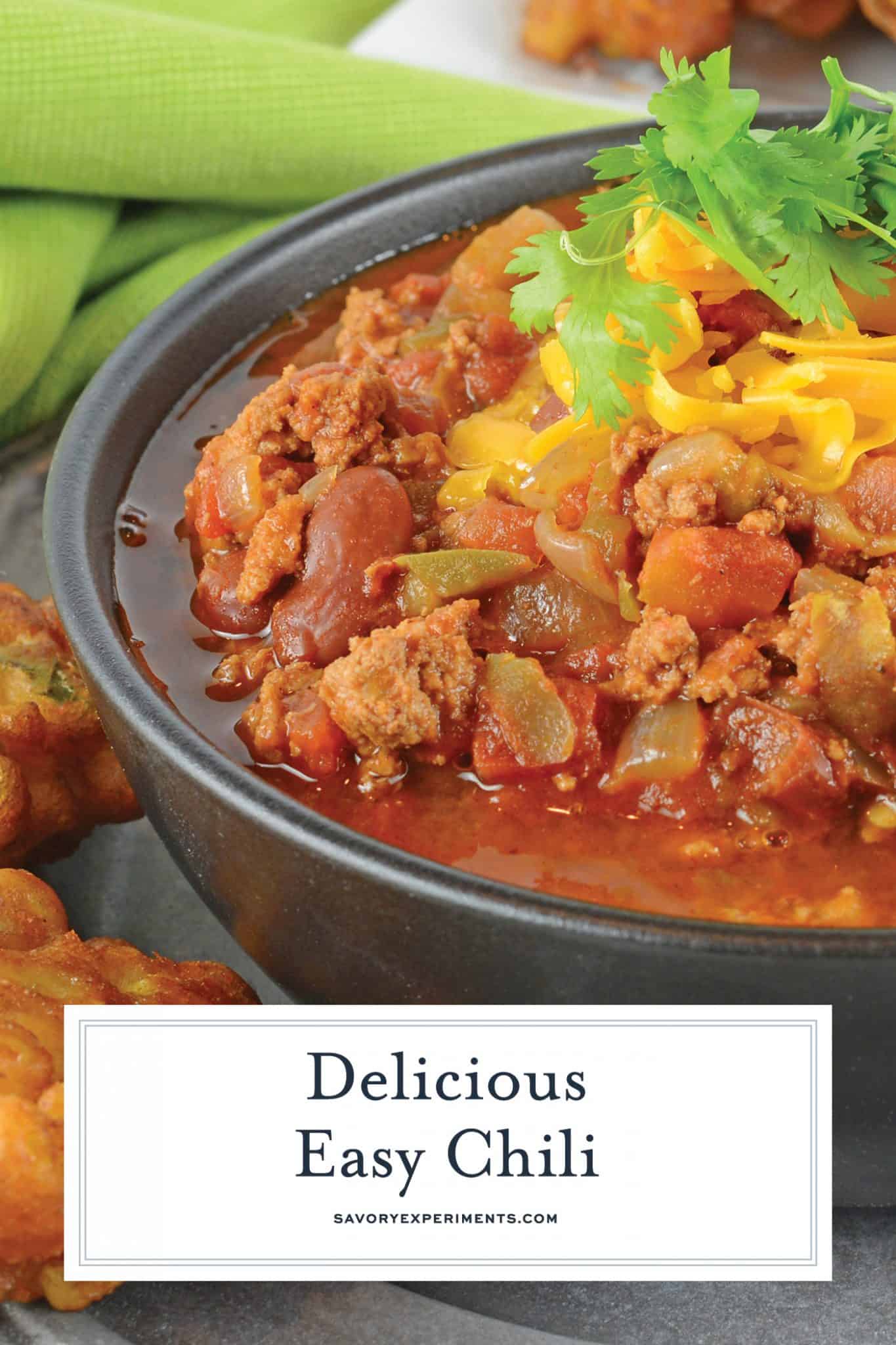 Easy Chili is a spicy mix full of ground beef, Italian sausage and vegetables, but the secret ingredient makes it different from every other chili out there! #chilirecipe #bestchilirecipe www.savoryexperiments.com