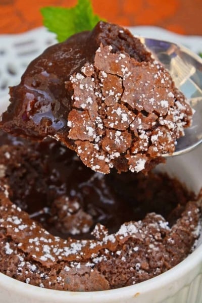 Red Wine Chocolate Lava Cake is so easy to make at home! This molten lava cake comes out of the oven piping hot in just about 30 minutes. #lavacakerecipe #moltenlavacake #chocolatecake www.savoryexperiments.com