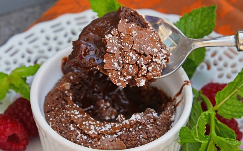 Red Wine Chocolate Lava Cake is so easy to make at home! This molten lava cake comes out of the oven piping hot in just about 30 minutes. #lavacakerecipe #moltenlavacake #chocolatecake www.savoryexperiments.com