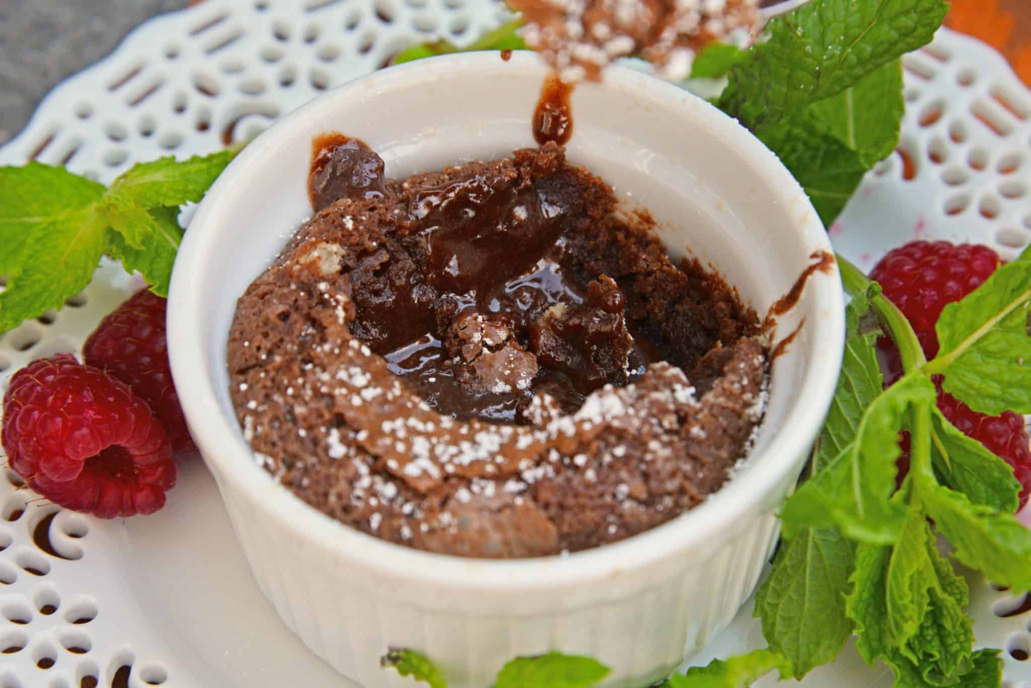 Red Wine Chocolate Lava Cake is so easy to make at home! This molten lava cake comes out of the oven piping hot in just about 30 minutes. #lavacakerecipe #moltenlavacake #chocolatecake www.savoryexperiments.com