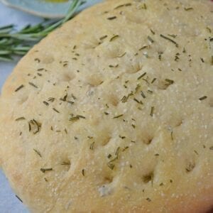 Rosemary Focaccia Bread is a recipe you can be proud of! Pair with homemade butter or olive oil bread dip for the best appetizer. #focacciabread #easybreadrecipes www.savoryexperiments.com