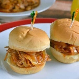 Slow Cooker Pineapple Pulled Pork Recipe- pineapple, pork and a simple BBQ sauce takes 10 minutes to put together for a tasty and quick meal.