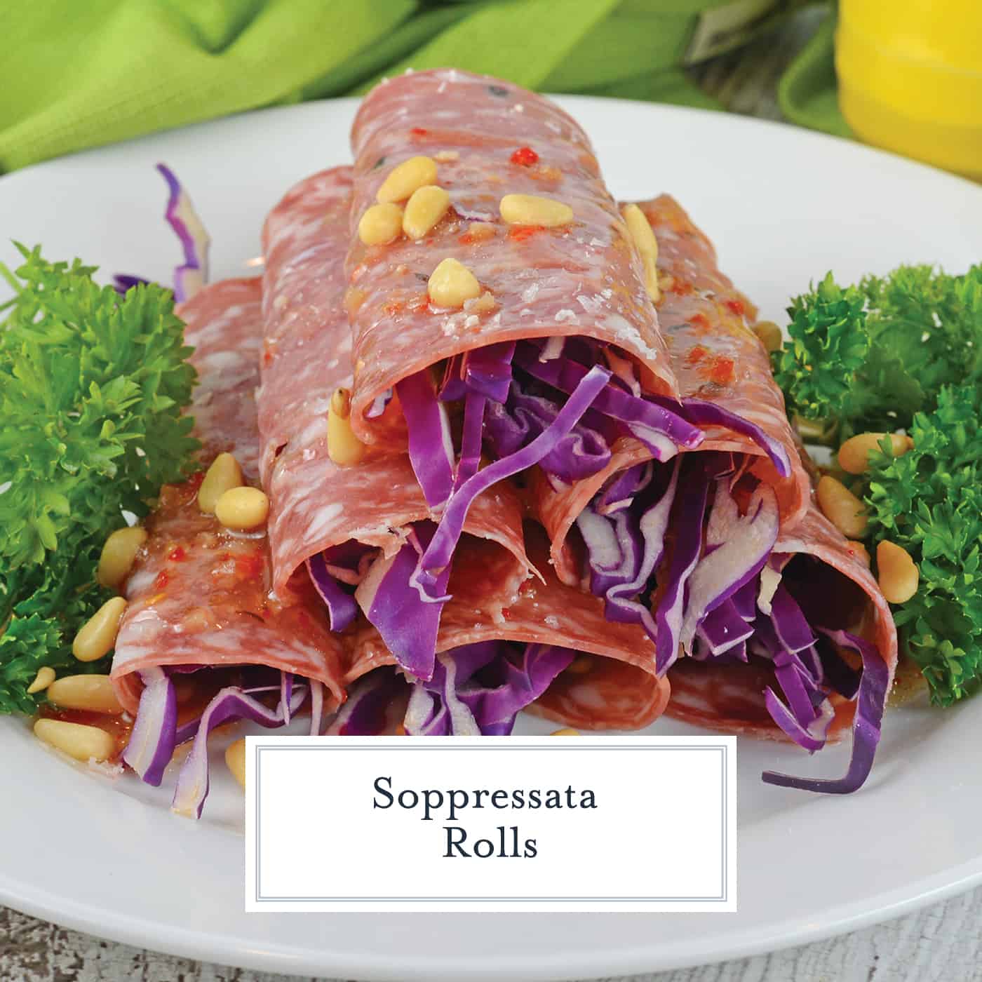 Soppressata Rolls are an easy, no cook appetizer filled with shredded red cabbage, pepperoncinis, goat cheese and zesty Italian dressing! #easyappetizerrecipes #nocookappetizer #coldappetizerrecipes www.savoryexperiments.com