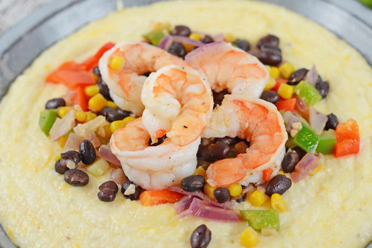This Southwestern Shrimp and Grits recipe is a new take on an old classic! It combines Texas Caviar with Creamy Cheddar Grits and shrimp! #shrimpandgritsrecipe #cheesyshrimpandgrits www.savoryexperiments.com