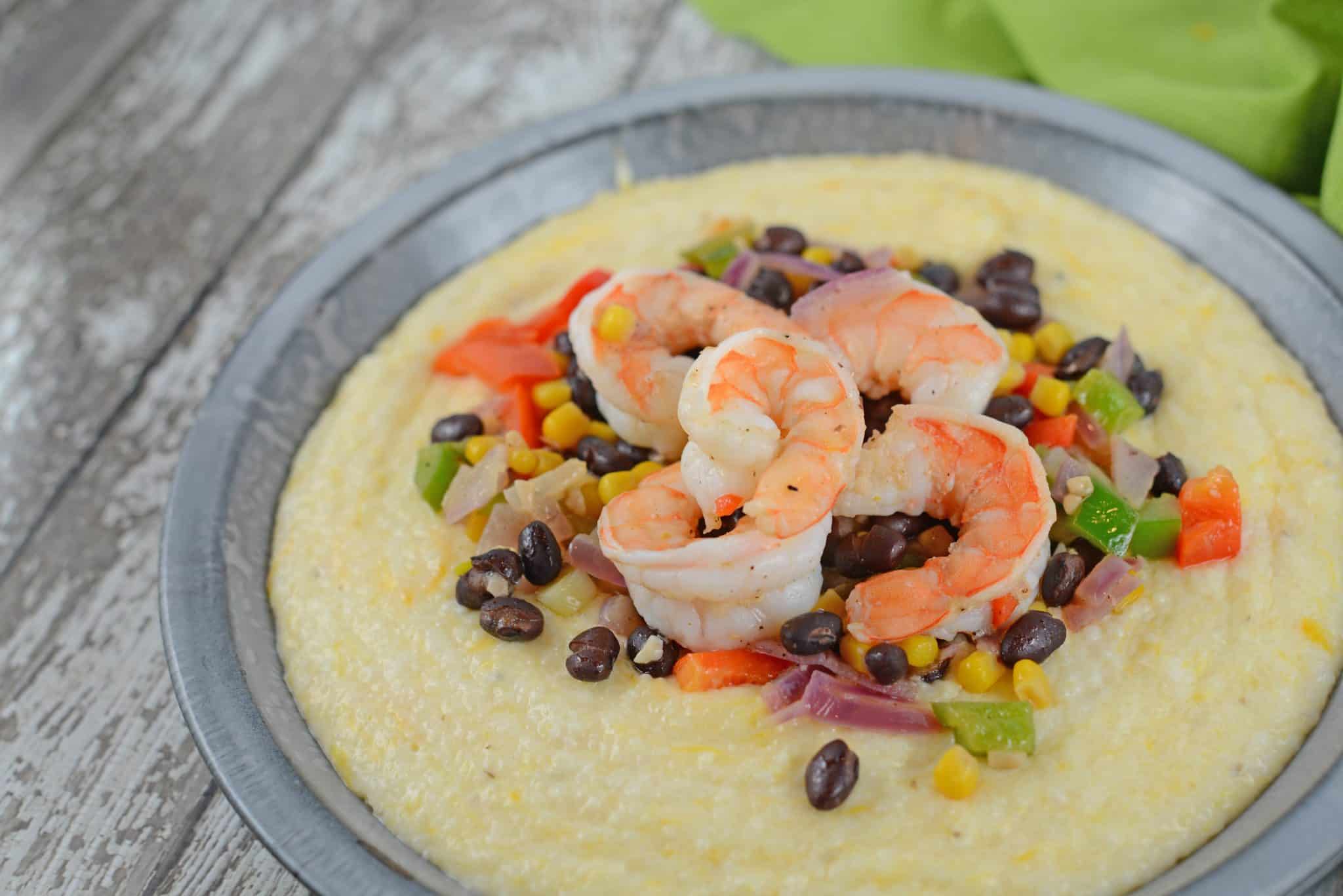 Southwestern Shrimp and Grits is a new take on an old classic combining Texas Caviar with Creamy Cheddar Grits and shrimp!