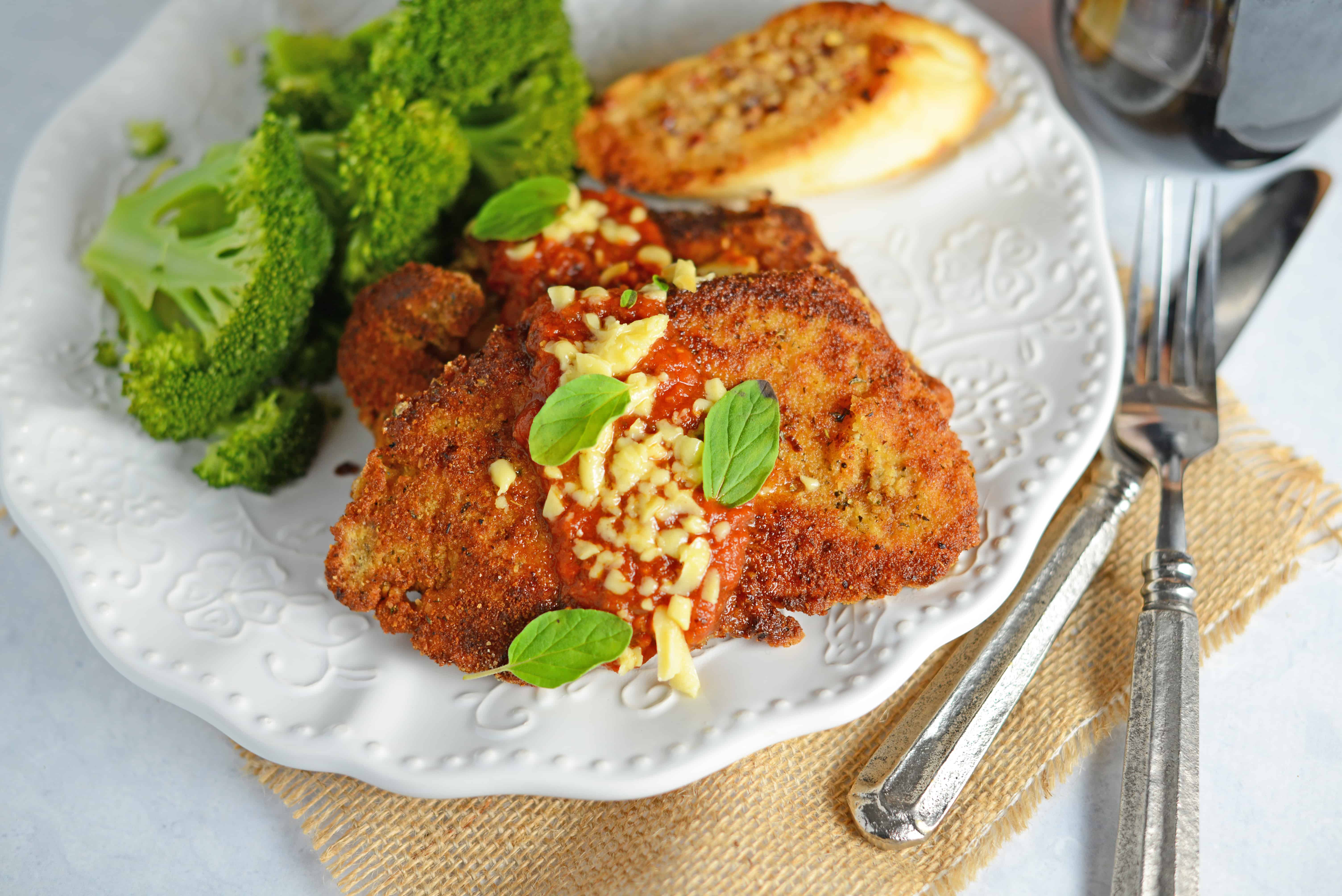 Chicken Parmesan Recipe- The BEST Chicken Parmesan. Chicken cutlets are a quick and easy 30 minute weeknight meal everyone will love! www.savoryexperiments.com