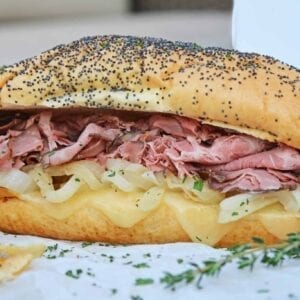 A close up of a french dip sandwich