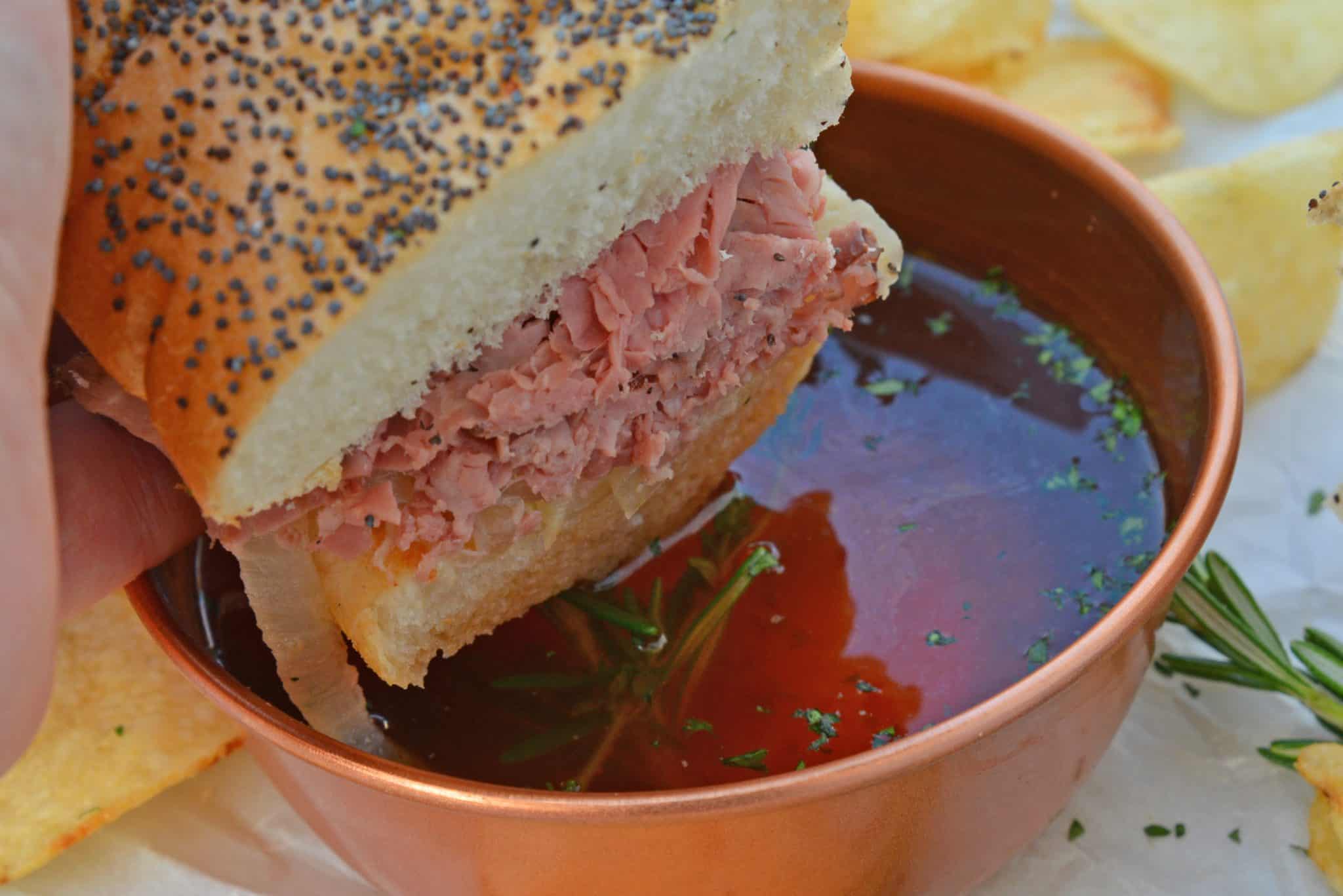 Easy French Dip Sandwiches are made from tender roast beef with caramelized onions, roasted garlic, whipped horseradish cream sauce on brioche rolls! #roastbeefsandwich #frenchdipsandwiches www.savoryexperiments.com