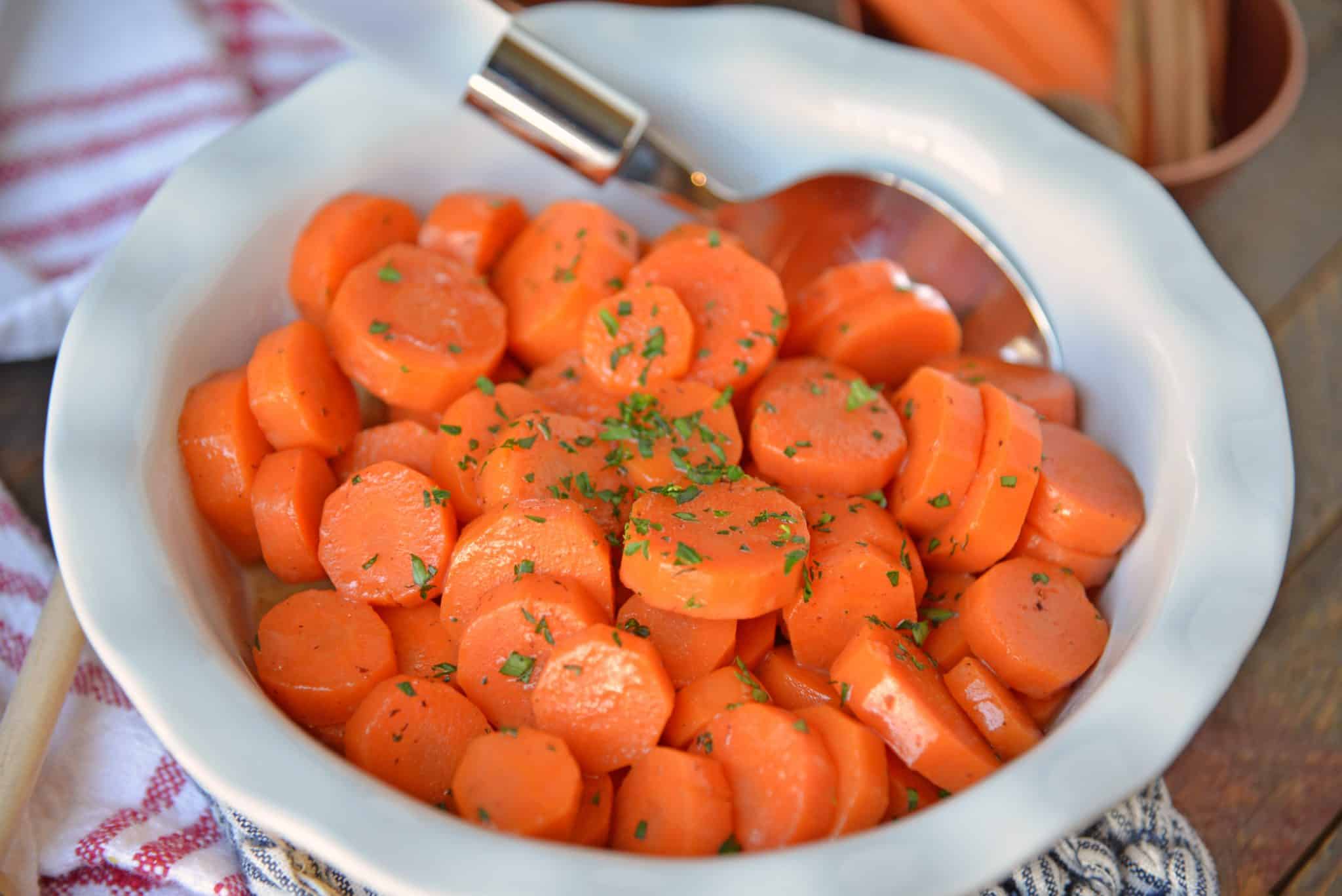 Honey Glazed Carrots are a simple dish with only a handful of ingredients that makes any family table shine! These candied carrots have a sweet & smoky flavor! #honeyglazedcarrots #candiedcarrots www.savoryexperiments.com