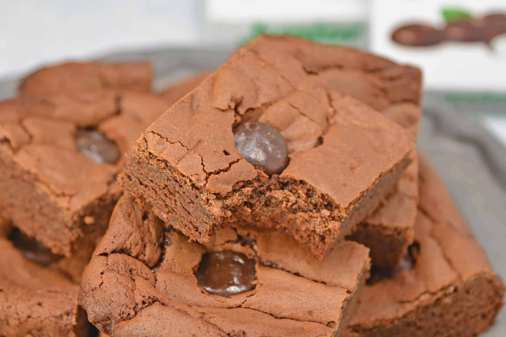 Junior Mint Brownies are homemade brownies blended with cool, creamy Junior Mints. This delicious chewy brownie recipe will satisfy any brownie cravings! #homemadebrownies #juniormints #chewybrownierecipe www.savoryexperiments.com