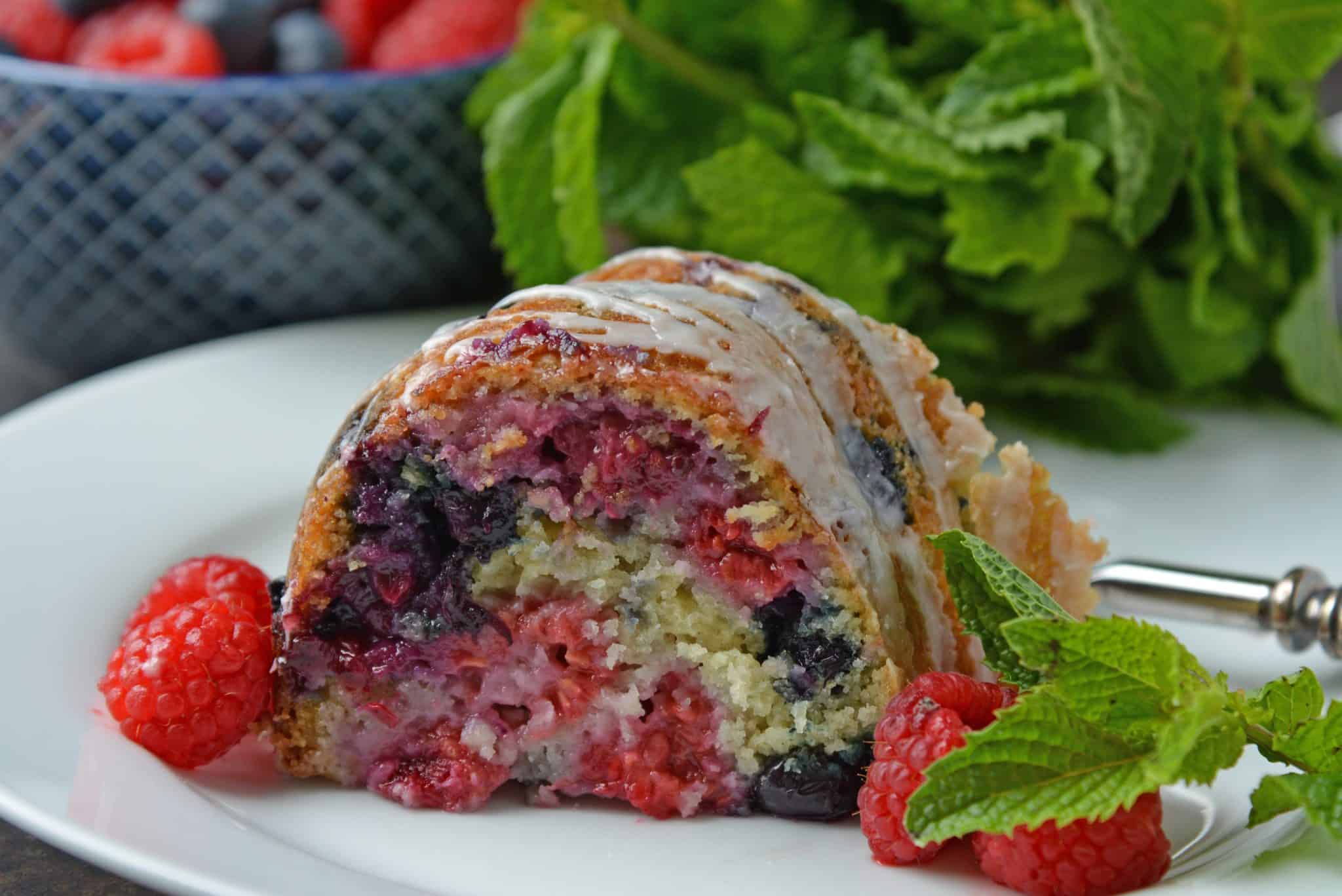 You will be making this Berry Buttermilk Pound Cake all year long! Fresh or frozen berries, this buttermilk cake is delicious and perfect for dessert or brunch. #buttermilkcake #buttermilkpoundcake www.savoryexperiments.com