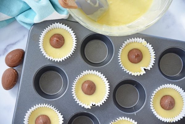 cadbury eggs in batter in muffin tin