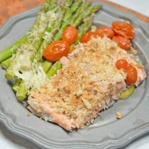 Sheet Pan Crispy Salmon is a fast, easy and healthy weeknight meal. Prep this sheet pan meal in just 5 minutes using tomatoes, asparagus and a crispy panko and walnut topping for you salmon.