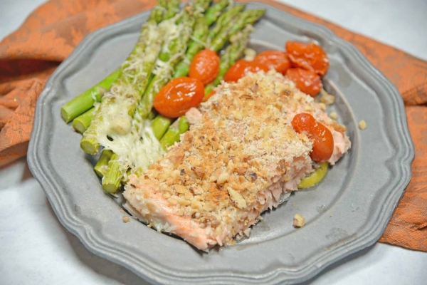 Crispy Salmon Sheet Pan Crispy Salmon is a fast, easy and healthy weeknight meal. Prep this sheet pan meal in just 5 minutes using tomatoes, asparagus and a crispy panko and walnut topping for you salmon.