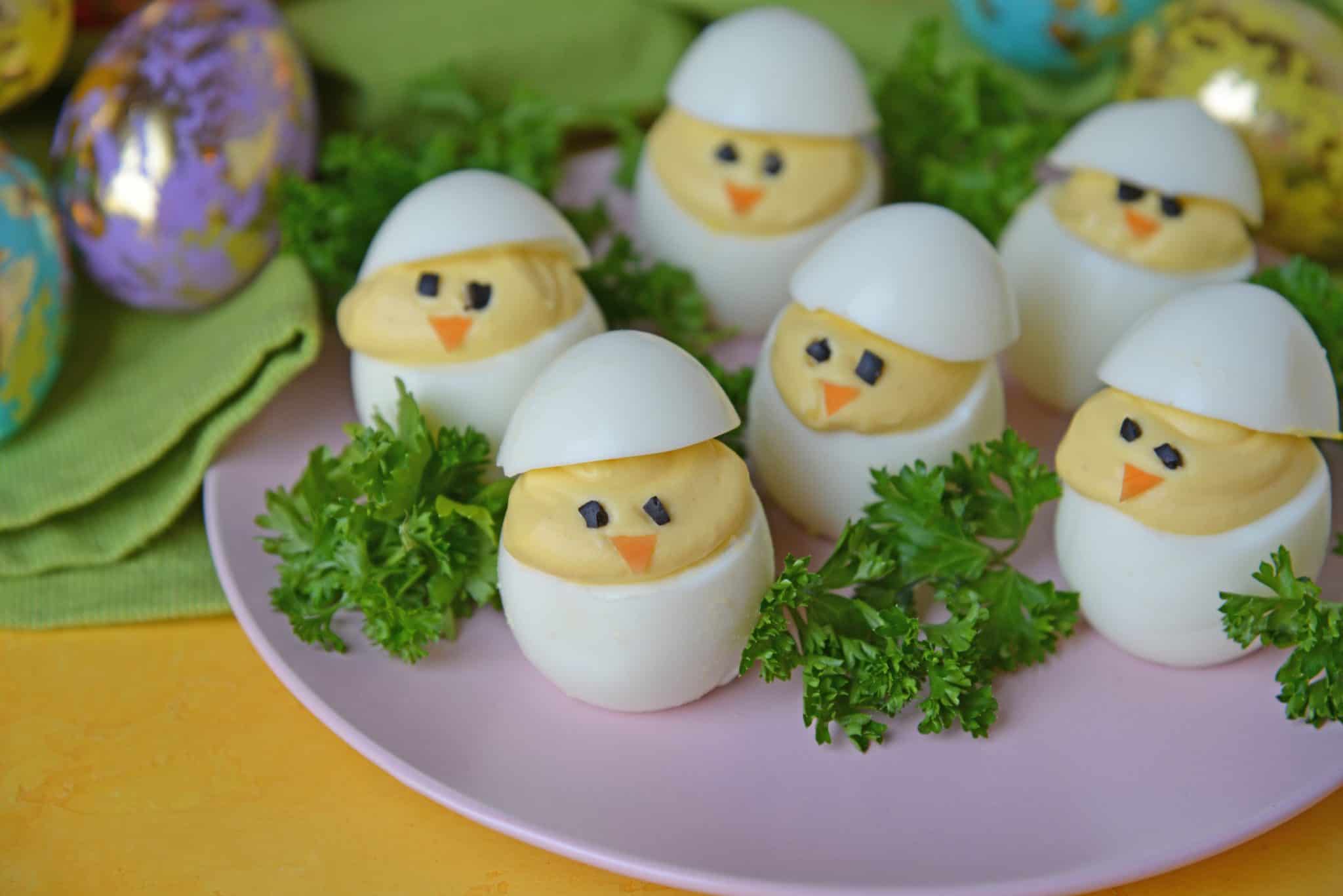 Deviled Egg Chicks take a classic deviled egg recipe and make them into Easter deviled eggs! Perfect as an Easter brunch recipe or appetizer. #deviledeggchicks #easterdeviledeggs www.savoryexperiments.com