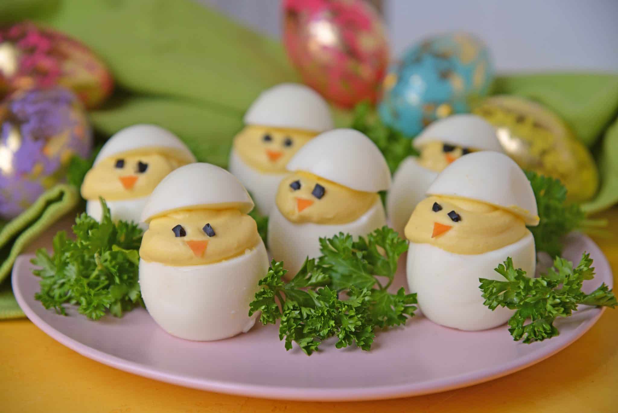 Deviled Egg Chicks take a classic deviled egg recipe and make them into Easter deviled eggs! Perfect as an Easter brunch recipe or appetizer. #deviledeggchicks #easterdeviledeggs www.savoryexperiments.com