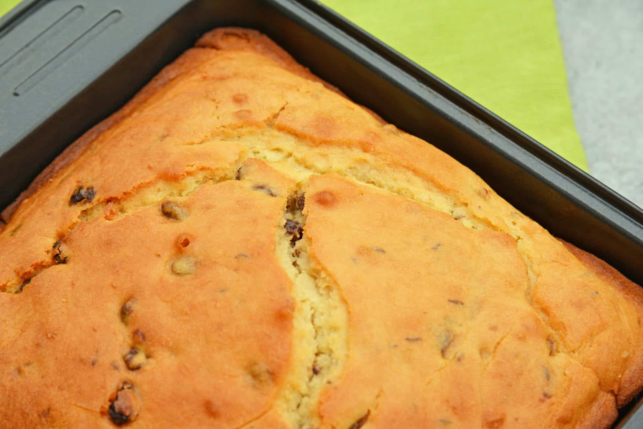 This Irish Soda Bread with Whiskey Glaze recipe is Irish food at its best! It consists of whiskey, caraway seeds, currants, and fresh orange juice and zest! #irishsodabreadrecipe #irishsodabreadhistory www.savoryexperiments.com 