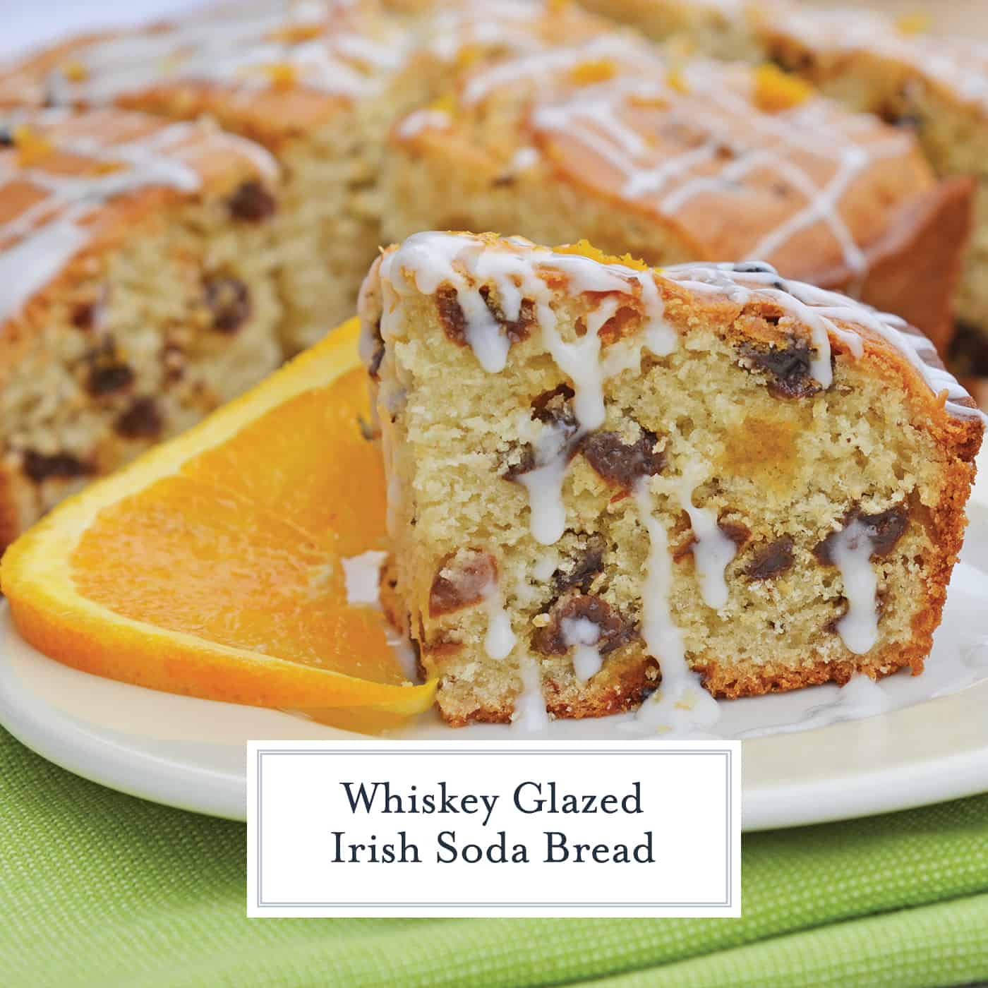 This Irish Soda Bread with Whiskey Glaze recipe is Irish food at its best! It consists of whiskey, caraway seeds, currants, and fresh orange juice and zest! #irishsodabreadrecipe #irishsodabreadhistory www.savoryexperiments.com 