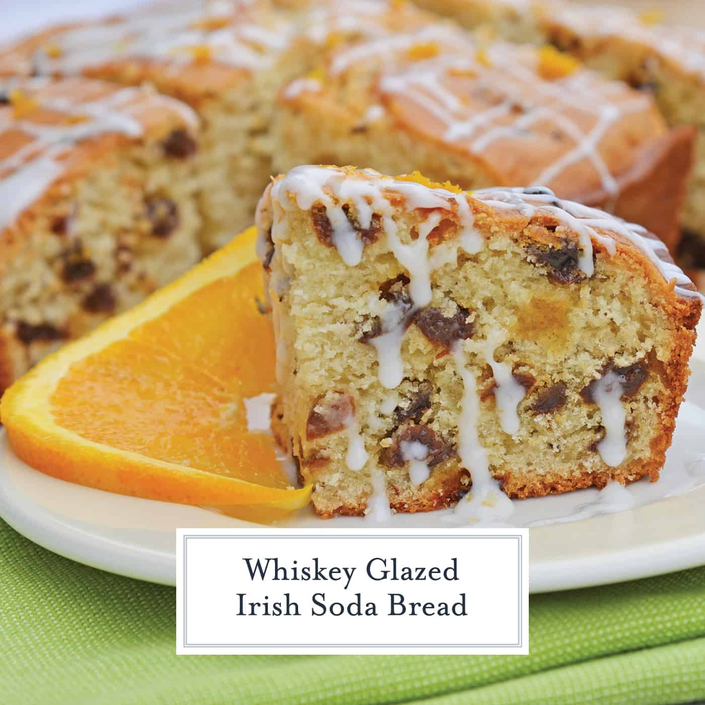 This Irish Soda Bread with Whiskey Glaze recipe is Irish food at its best! It consists of whiskey, caraway seeds, currants, and fresh orange juice and zest! #irishsodabreadrecipe #irishsodabreadhistory www.savoryexperiments.com