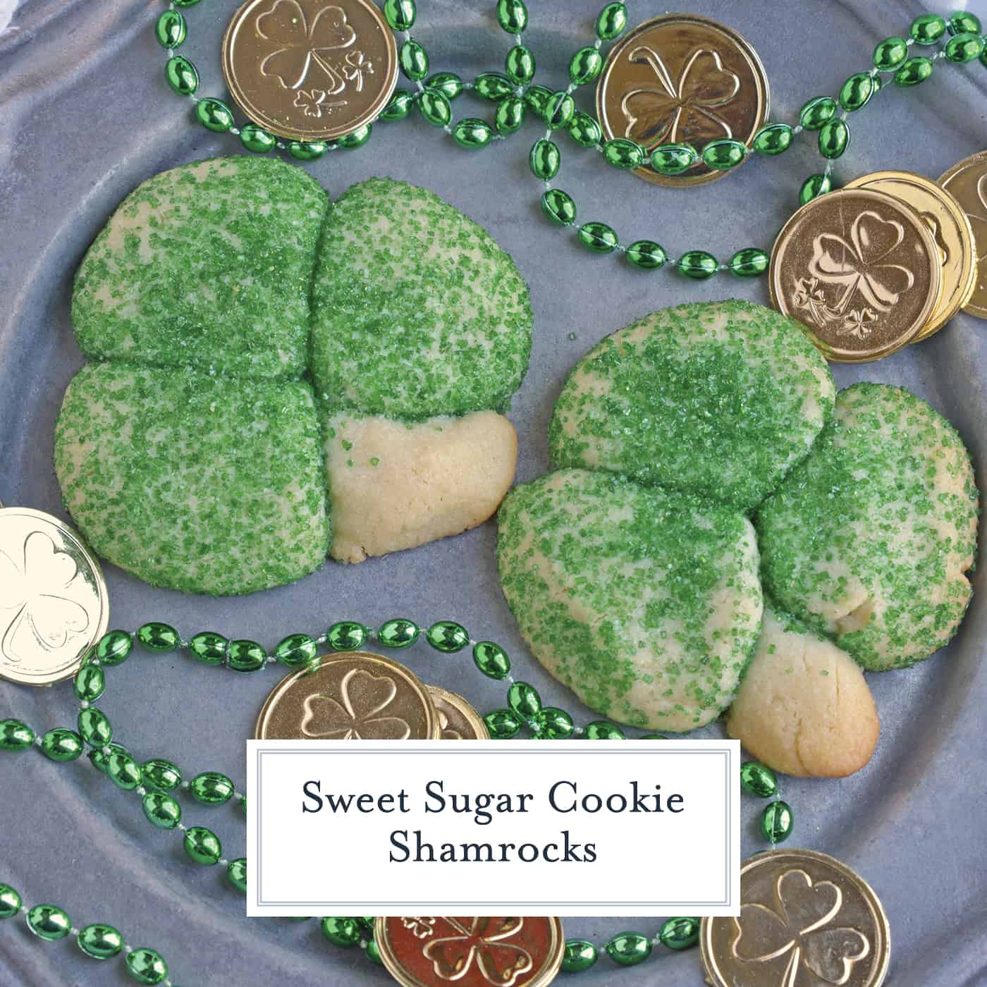 Sugar Cookie Shamrocks bring the luck of the Irish with them. St. Patrick's Day cookies creatively molded to make green lucky clovers, a great St. Patrick's Day dessert recipe. #stpatricksdayfood #stpatricksdaydessert www.savoryexperiments.com