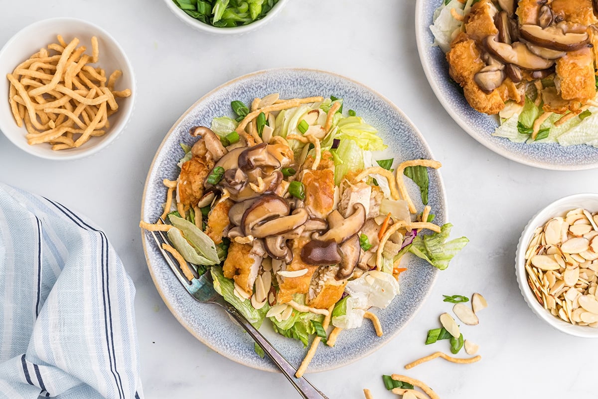 overhead of chinese almond chicken on a serving plate