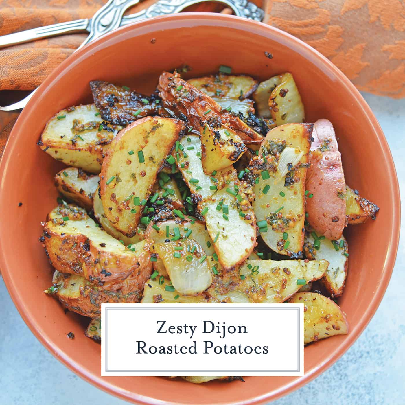 This Dijon Roasted Potatoes recipe is the perfect potato side dish to serve alongside chicken or steak! These oven roasted potatoes are packed full of flavor! #ovenroastedpotatoes #roastedpotatoesrecipe www.savoryexperiments.com