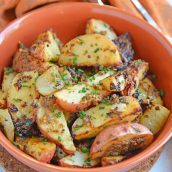 This Dijon Roasted Potatoes recipe is the perfect potato side dish to serve alongside chicken or steak! These oven roasted potatoes are packed full of flavor! #ovenroastedpotatoes #roastedpotatoesrecipe www.savoryexperiments.com