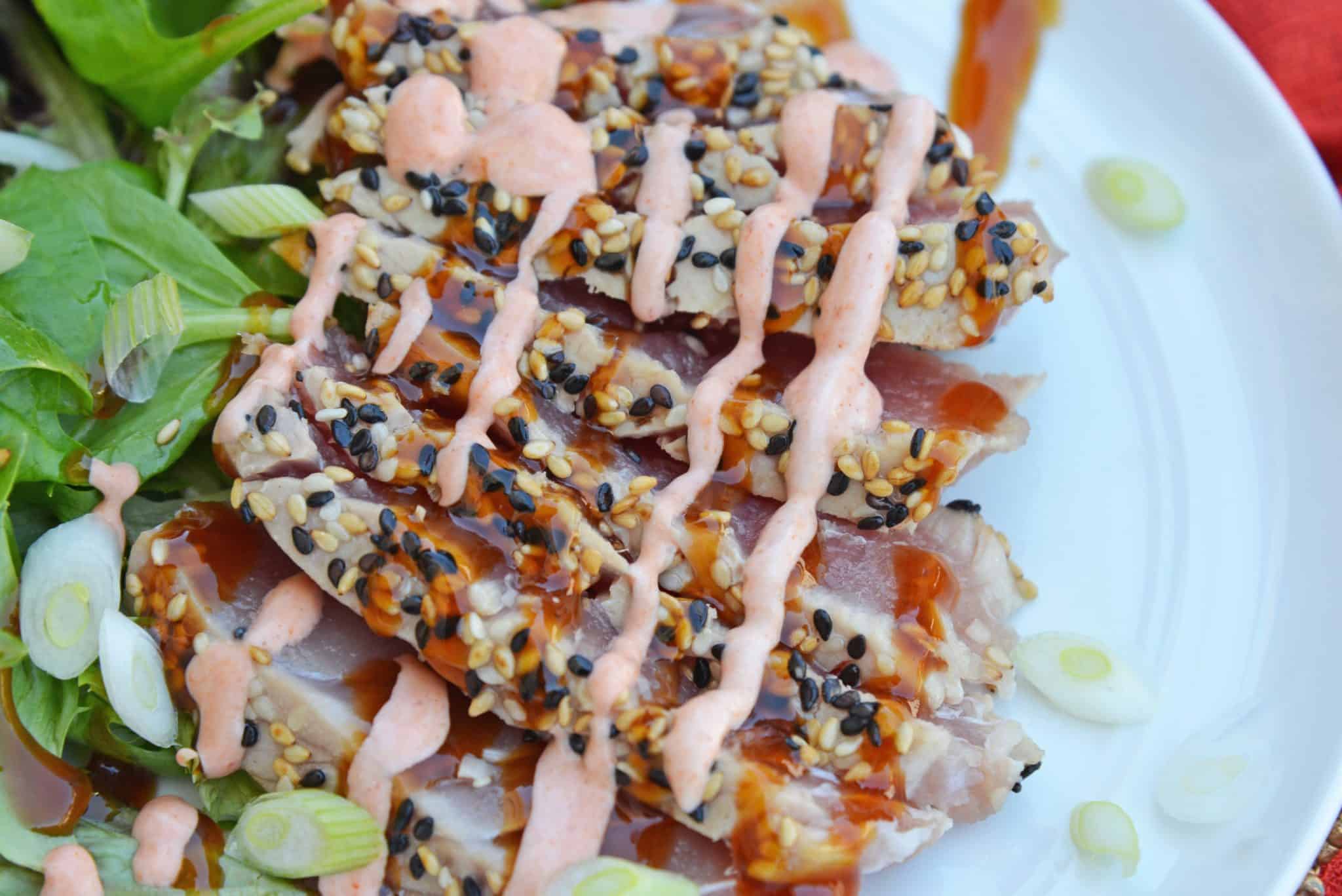 This Teriyaki Tuna recipe brings a delicious and healthy meal to the table in just over 20 minutes! This ahi tuna recipe is a quick and easy meal! #teriyakituna #tunarecipes www.savoryexperiments.com
