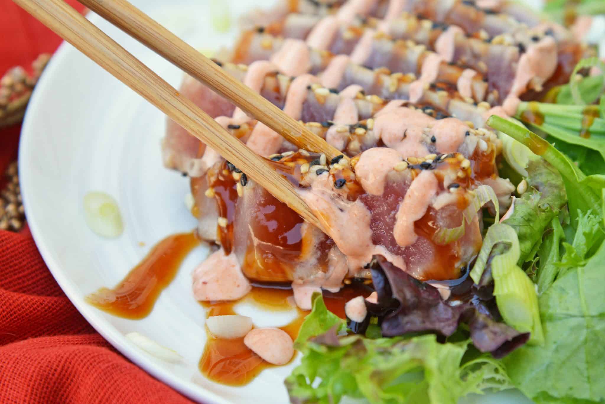 This Teriyaki Tuna recipe brings a delicious and healthy meal to the table in just over 20 minutes! This ahi tuna recipe is a quick and easy meal! #teriyakituna #tunarecipes www.savoryexperiments.com