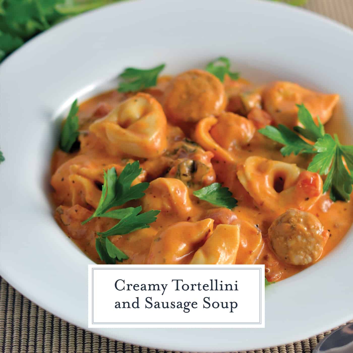 Creamy Tortellini and Sausage Soup can be made in the slow cooker, instant pot or on the stove top. Cheesy tortellini with zesty sauce in a tomato based soup! #sausagesoup #tortellinisoup #slowcookersoup www.savoryexperiments.com 