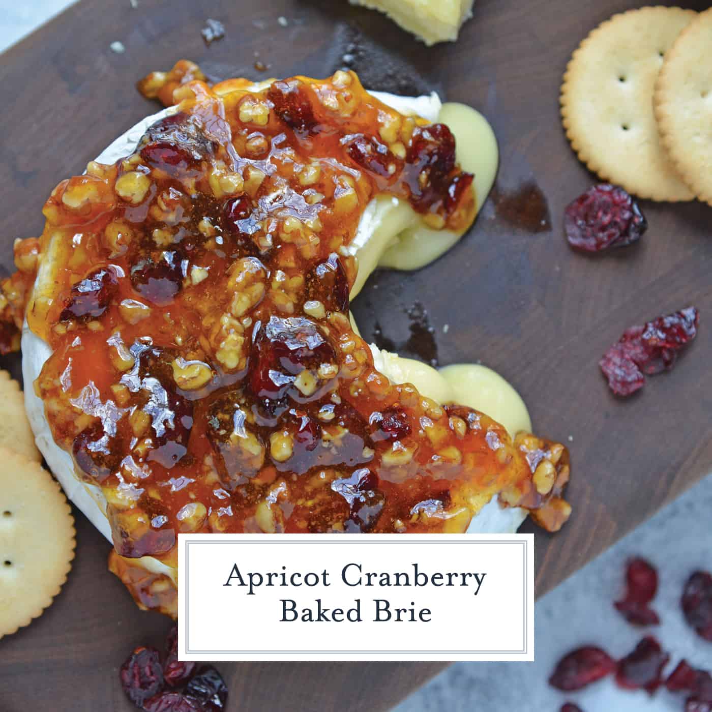 Apricot Cranberry Baked Brie is the ultimate appetizer. This baked brie appetizer will be perfect for any occasion. #bakedbrierecipe #bakedbrieappetizer www.savoryexperiments.com