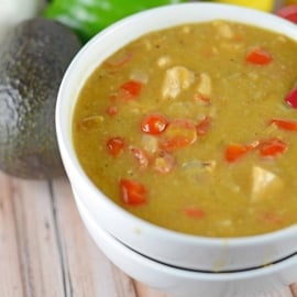 Chile Verde- green chile with tomatoes and spices served over a giant burrito, eggs, refried beans or in tacos. www.savoryexperiments.com