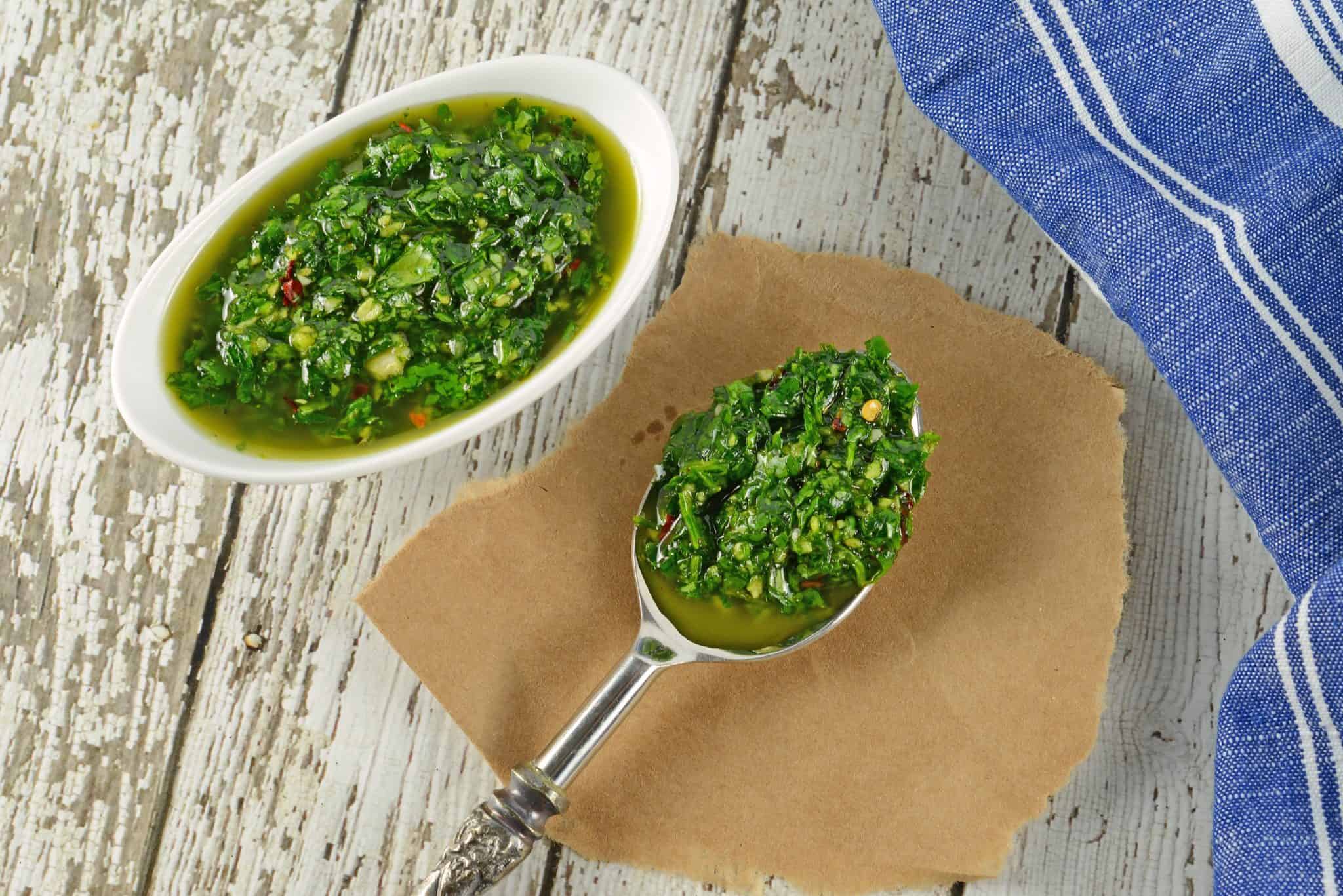 Authentic Chimichurri Sauce is easy to make and doubles as a marinade and sauce. Traditional chimichurri ingredients will flavor any dish!