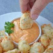 Fried Cheese Curds, also known as Beer Battered Cheese Curds, as the perfect fried cheese balls! Gooey little nuggets paired with a tangy dipping sauce. A great easy appetizer for snack idea!