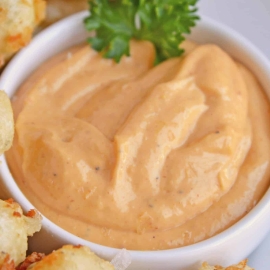 Close up of bloomin onion sauce in a white bowl