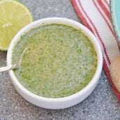 Cilantro Lime Dressing is an easy and delicious citrus dressing for salads, dipping sauces or even as a marinade! Spicy and sweet, it is no-cook and comes together in 5 minutes. #homemadesaladdressing www.savoryexperiments.com