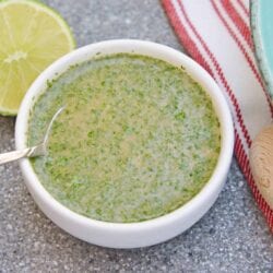 Cilantro Lime Dressing is an easy and delicious citrus dressing for salads, dipping sauces or even as a marinade! Spicy and sweet, it is no-cook and comes together in 5 minutes. #homemadesaladdressing www.savoryexperiments.com