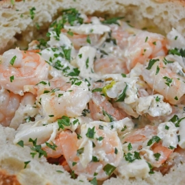 Creamy Shrimp Scampi Bread Bowl can be an easy appetizer or entree, dipping bread in the rich scampi sauce with succulent shrimp.