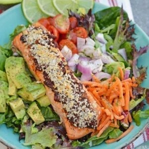 Crispy Chipotle Salmon Salad is a simple and healthy salad filled with a fun texture and spicy chipotle peppers. Top with Cilantro Lime Dressing. #salmonsaladrecipe #saladrecipes #bakedsalmonrecipe www.savoryexperiments.com