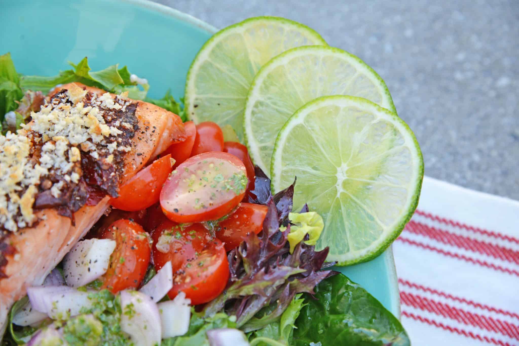 Crispy Chipotle Salmon Salad is a simple and healthy salad filled with a fun texture and spicy chipotle peppers. Top with Cilantro Lime Dressing. #salmonsaladrecipe #saladrecipes #bakedsalmonrecipe www.savoryexperiments.com