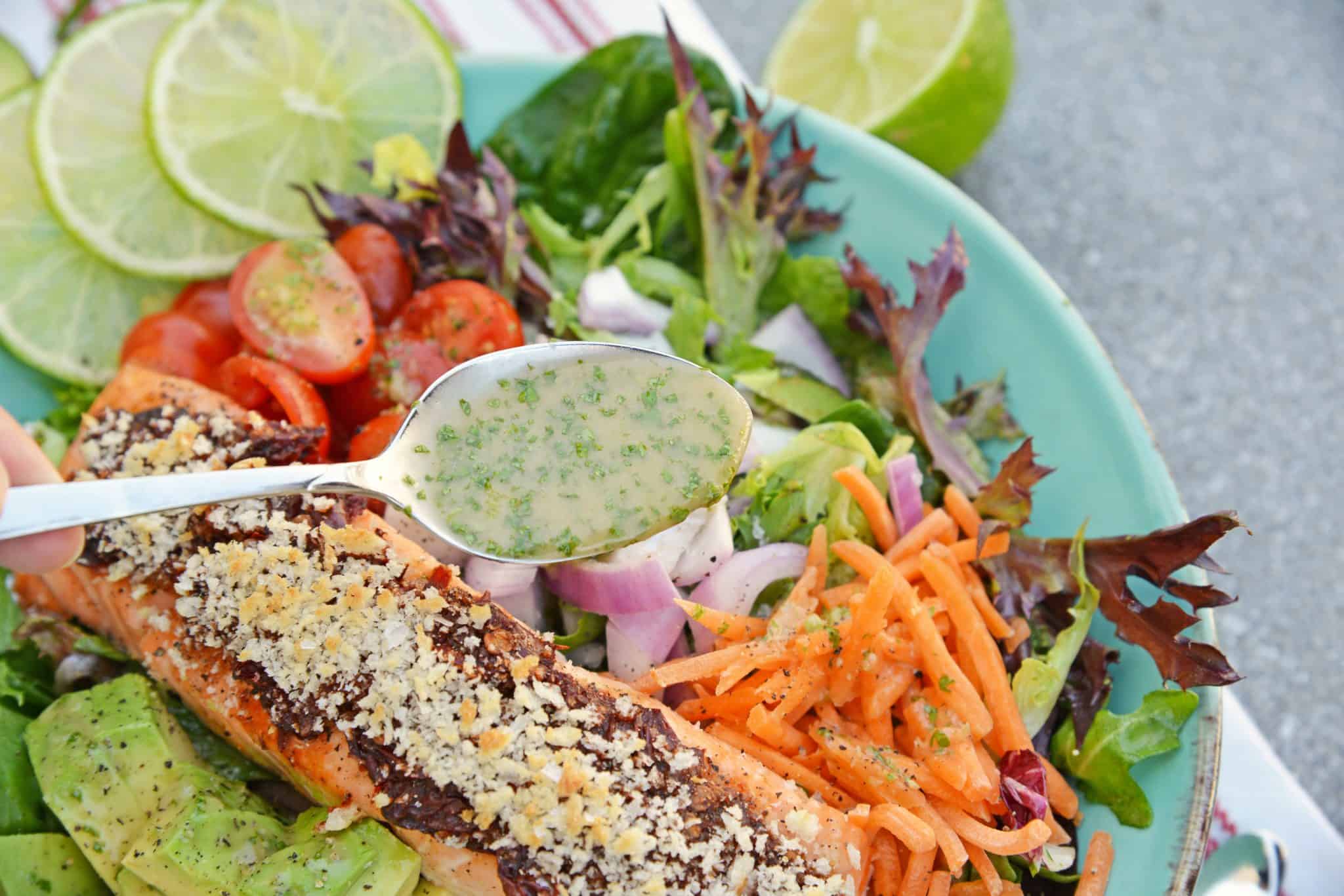 Crispy Chipotle Salmon Salad is a simple and healthy salad filled with a fun texture and spicy chipotle peppers. Top with Cilantro Lime Dressing. #salmonsaladrecipe #saladrecipes #bakedsalmonrecipe www.savoryexperiments.com