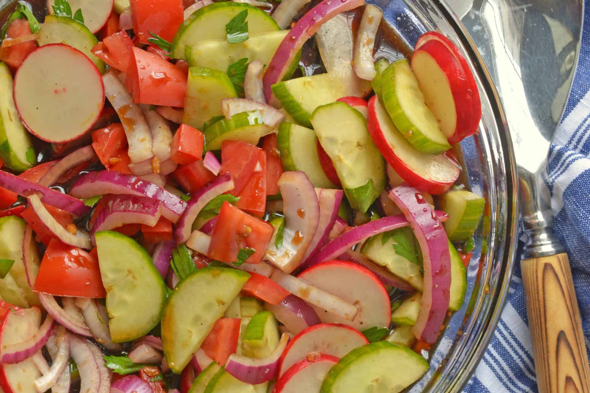 Fattoush Salad is of Arabic descent consisting of marinated vegetables, usually tomatoes and radishes, and tossed with grilled flatbread. #fattoushsalad www.savoryexperiments.com