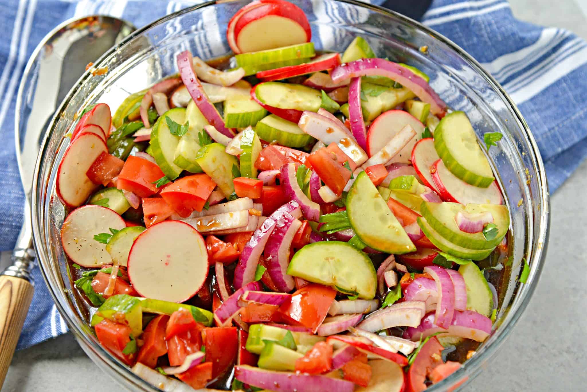 Fattoush Salad is of Arabic descent consisting of marinated vegetables, usually tomatoes and radishes, and tossed with grilled flatbread. #fattoushsalad www.savoryexperiments.com 