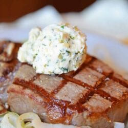 Garlic Butter Steak is perfect for any occasion! Grilled filet mignon is perfect for a special date night or just for a typical weeknight meal! #filetmignonrecipe #garlicbuttersteak #grillingfiletmignon www.savoryexperiments.com