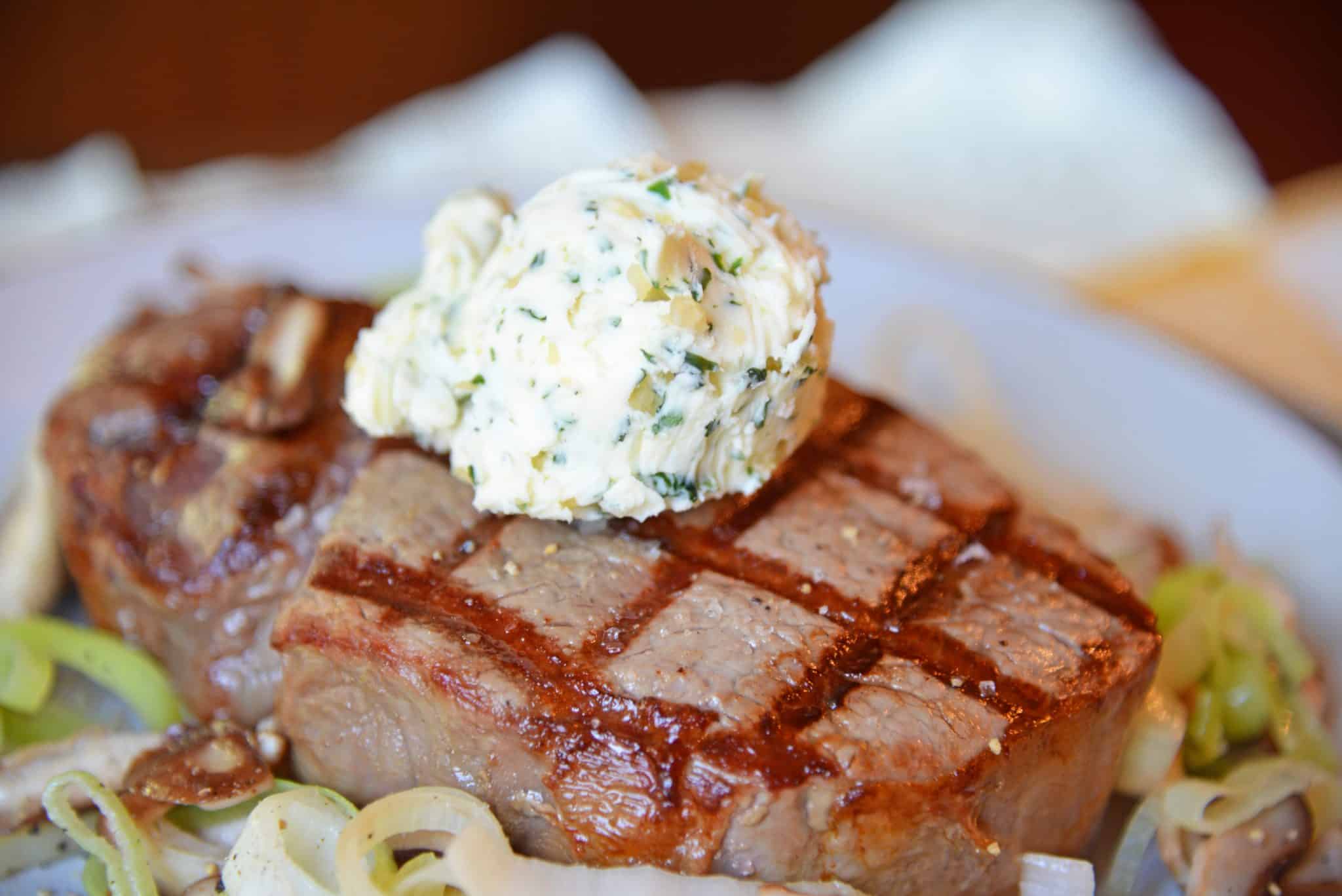 cognac butter on top of a grilled steak 