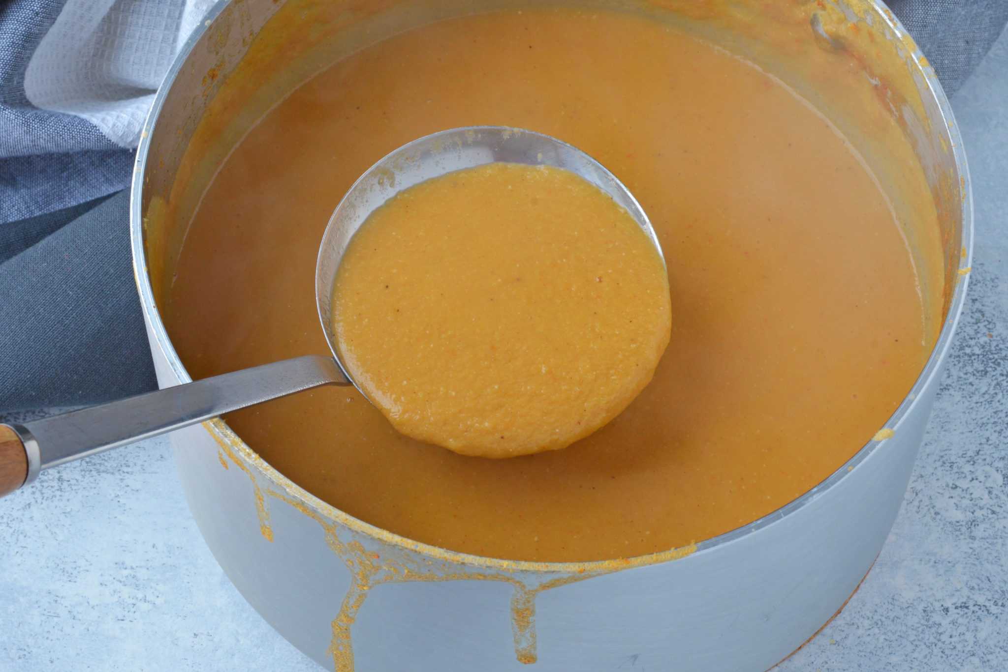 Red Lentil Soup is the best comfort food for a cold or rainy day. Packed full of vegetables and spices, this easy soup recipe is hearty enough for a meal. #lentilsouprecipes #redlentilrecipes www.savoryexperiments.com